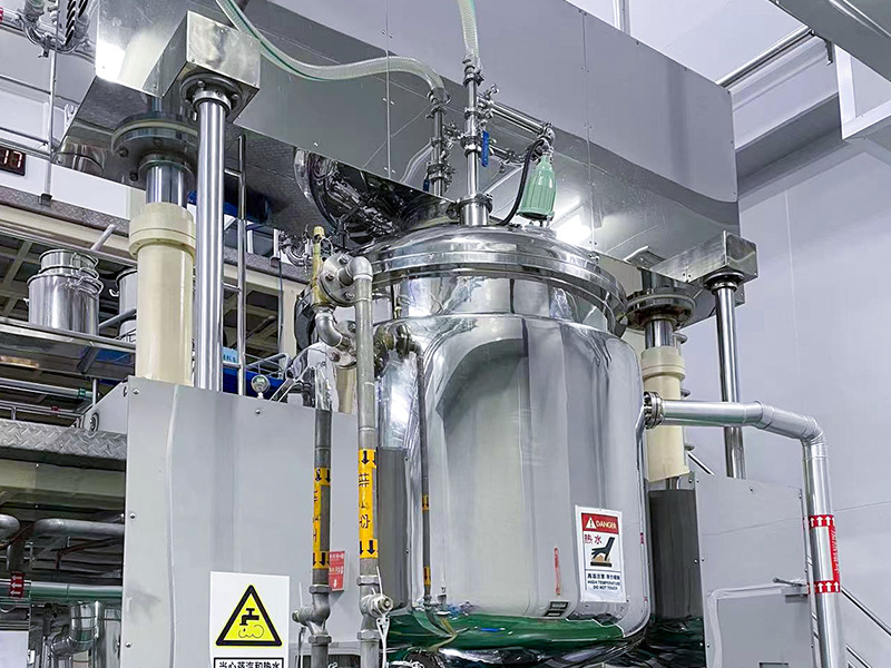 Industrial stainless steel reactor with a nutsche filter dryer, vacuum emulsification tank, and mixing tank for low temperature evaporation.